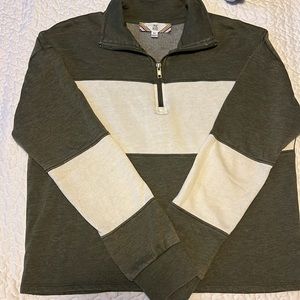 Pink rose sweater olive green with white on the sleeve.